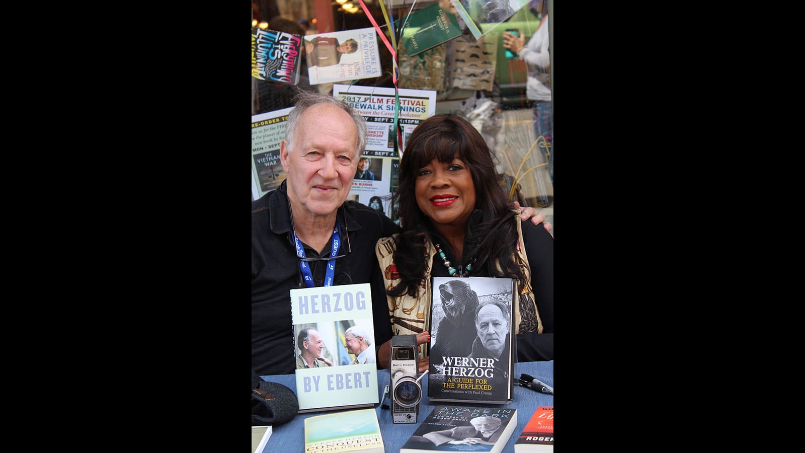 Werner Herzog and Chaz Ebert, wife of the late Roger Ebert, participate in a book signing on Telluride’s main street.