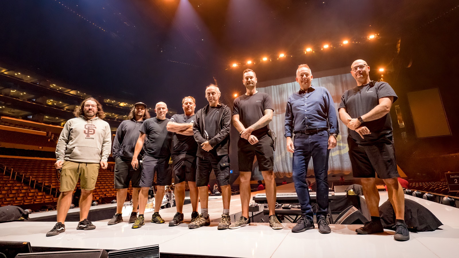 (L-R) Francis Lussier, PA Tech; Jonathan Aube, RF engineer; Martin Paré, Monitor Engineer; Jeremy Walls, PA Tech; Renato Petruzziello, Monitor Engineer; Sebastien Richard, PA Tech; Craig Doubet, FOH Engineer; Fred Cantin, System Tech/Crew Chief